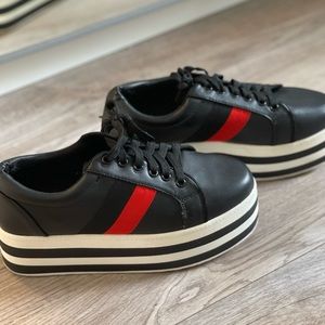 Black platform sneakers